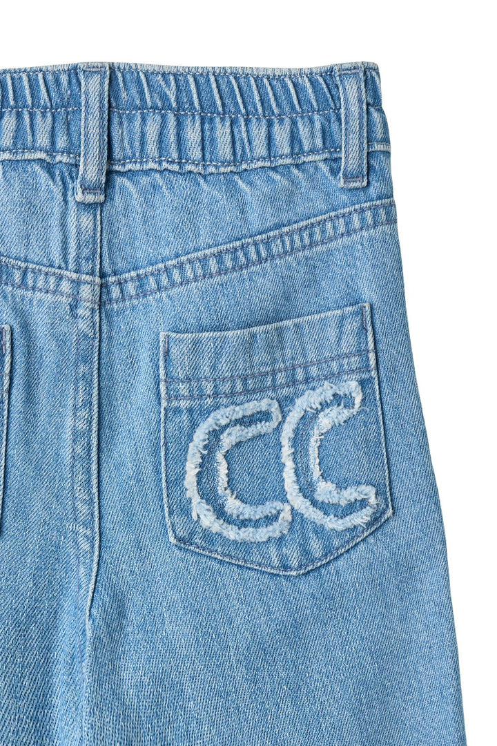 BRED JEANS M. BRODERI PÅ LOMME - LT BLUE INDIGO WASHED