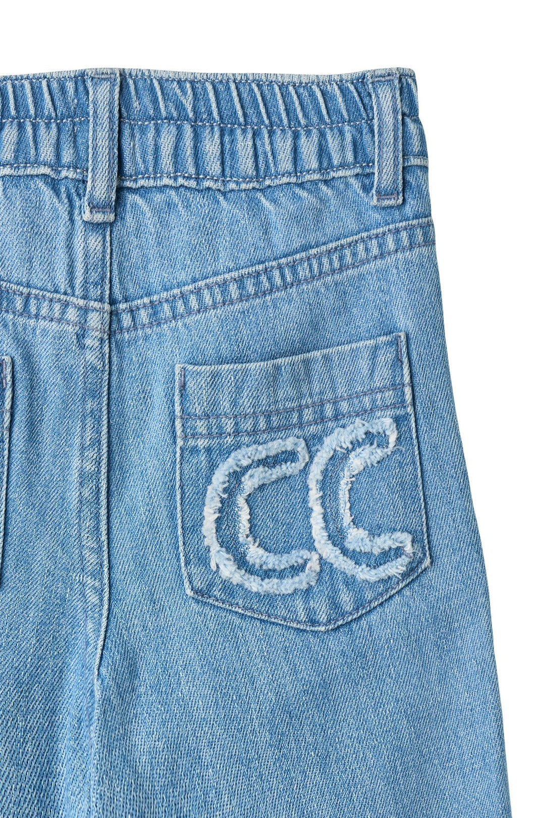 BRED JEANS M. BRODERI PÅ LOMME - LT BLUE INDIGO WASHED