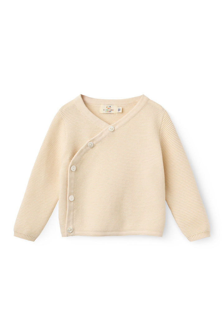 Bomuldsstrikket Baby cardigan m. skrå sidelukning - CREAM